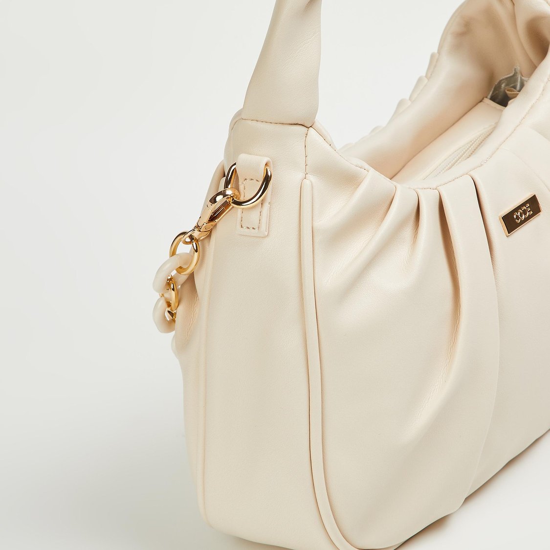 Buy CODE Women Solid Hobo Bag from CODE at just INR 1799.0