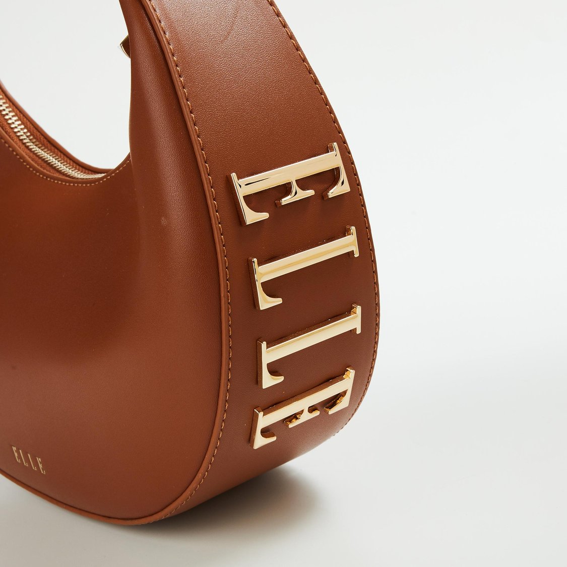 Buy ELLE Women Solid Sling Bag from Elle at just INR 3999.0