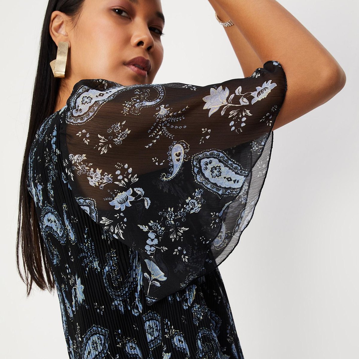 Buy Women Pleated Peplum Top Online at just Rs. 799.0