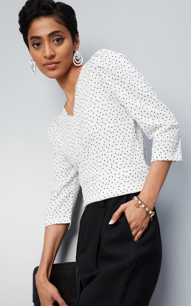 Buy Women Polka Dot Top with Lace Trim Online at just Rs. 899.0