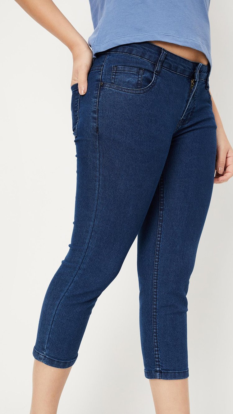 Buy Women Solid Denim Capris Online at just