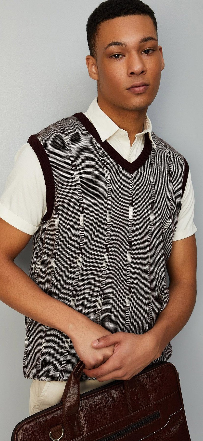 Buy Men Reversible Sweater Vest Online at just Rs. 999.0