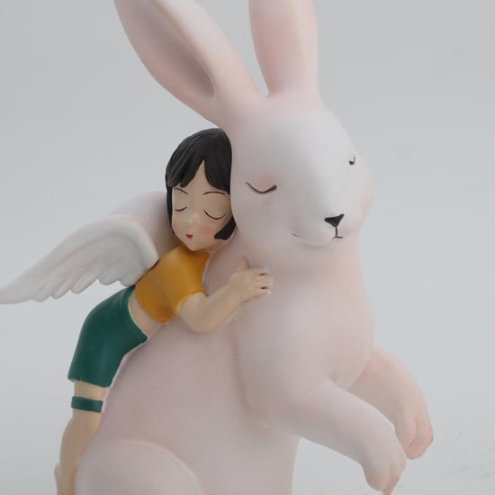 Souvenir Polyresin Girl on Rabbit Figurine
