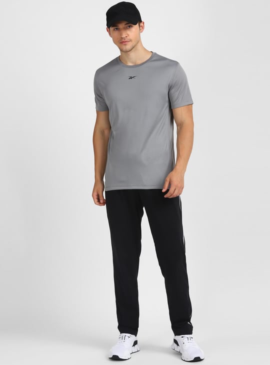 REEBOK Men Solid Elasticated Track Pants Black