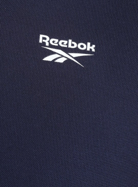REEBOK Men Solid Sports Polo T-shirt