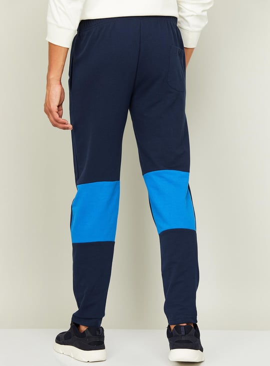 Superman track pants online