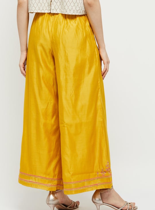 Women Embroidered Elasticated Flared Palazzos Embroidered