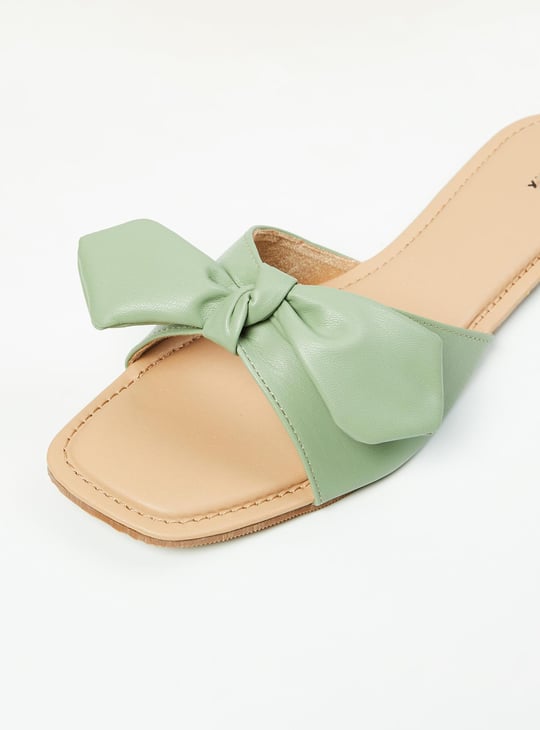 Women Solid Bow Detailed Sliders