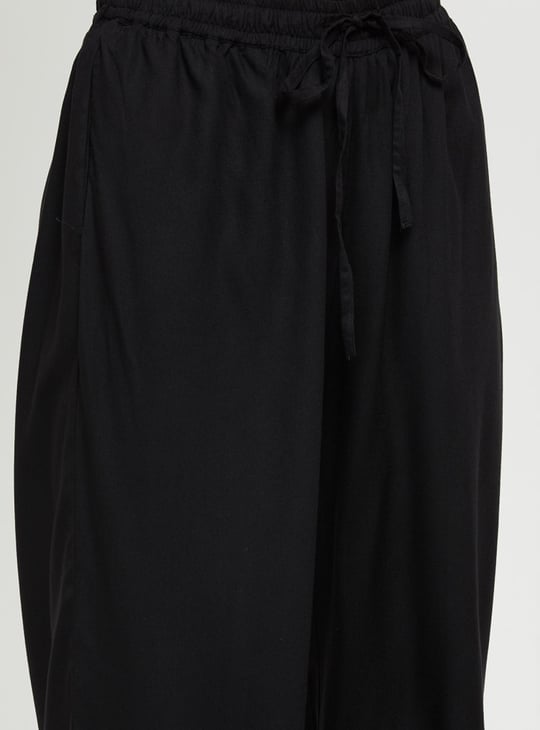 Women Solid Ankle-Length Elasticated Palazzos