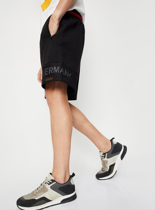 Men Typographic Printed Athleisure Football Shorts