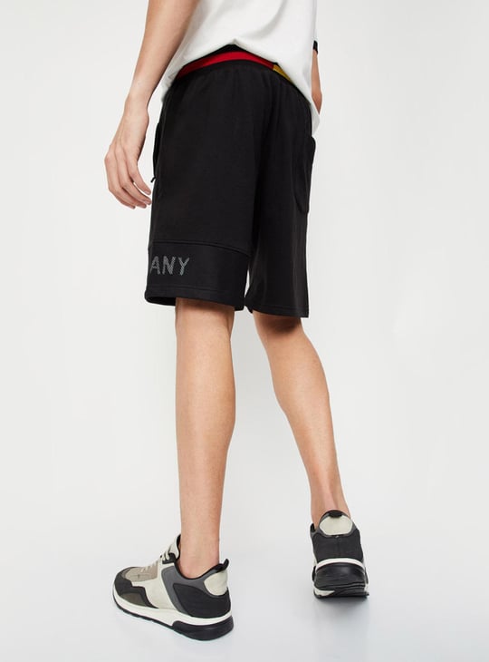 Men Typographic Printed Athleisure Football Shorts