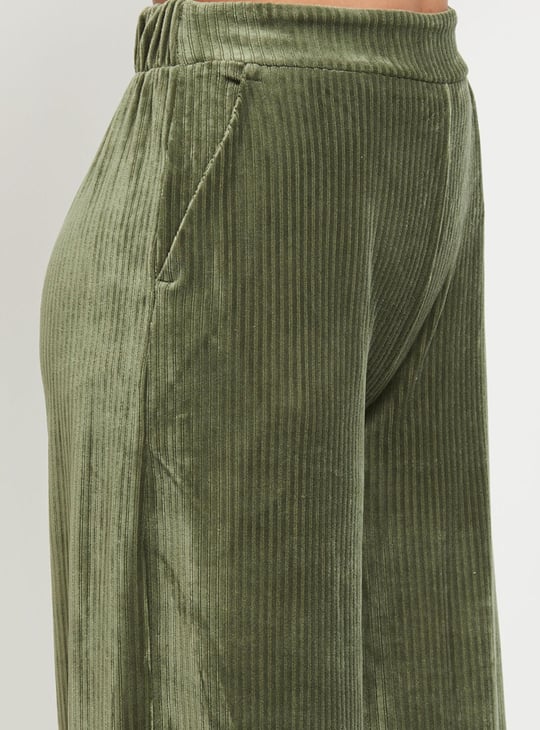 Women Textured Elasticated Waist Flared Corduroy Trousers