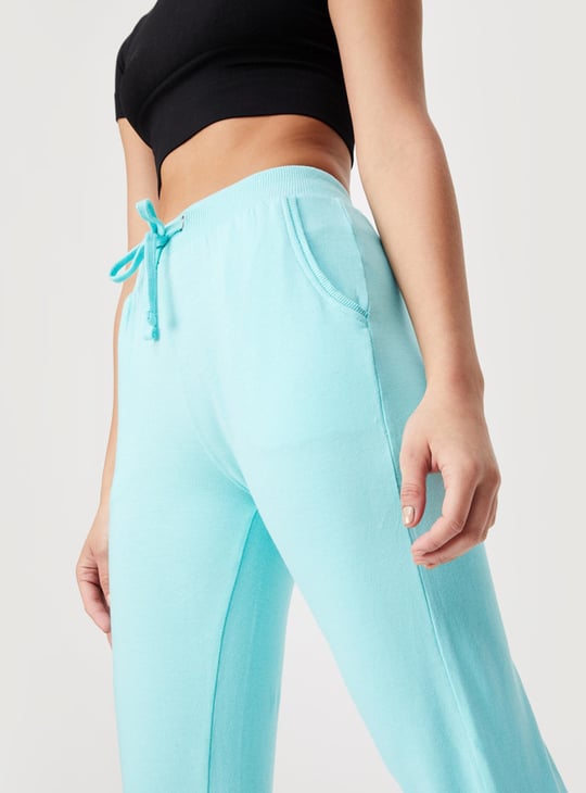 Women Solid Elasticated Sports Capris