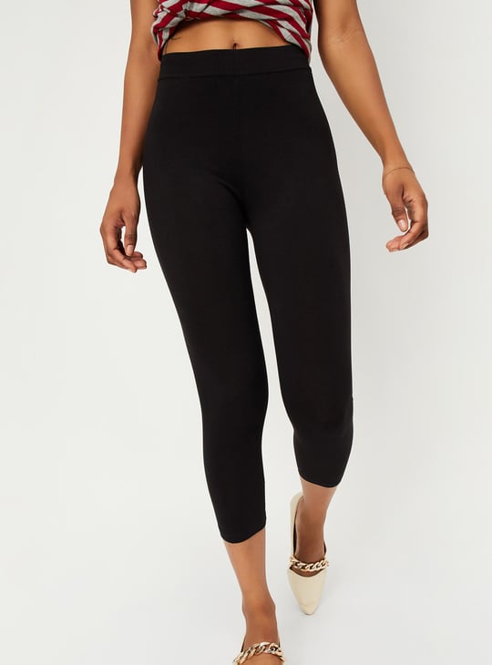 Buy Women Solid Elasticated Capri Leggings Online at just Rs Buy Women Solid Elasticated Capri Leggings Online at just Rs