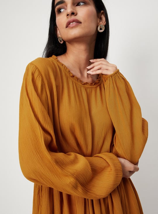 Women Solid Full Sleeves Tunic