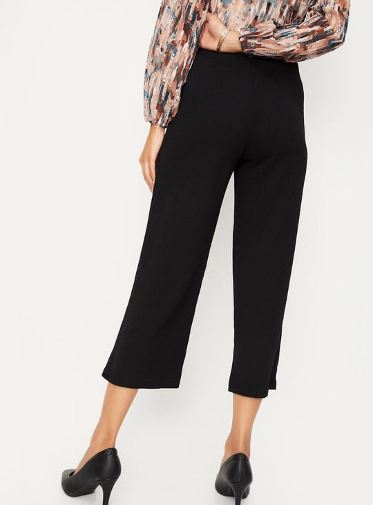 Women Textured Knit Flared Trousers
