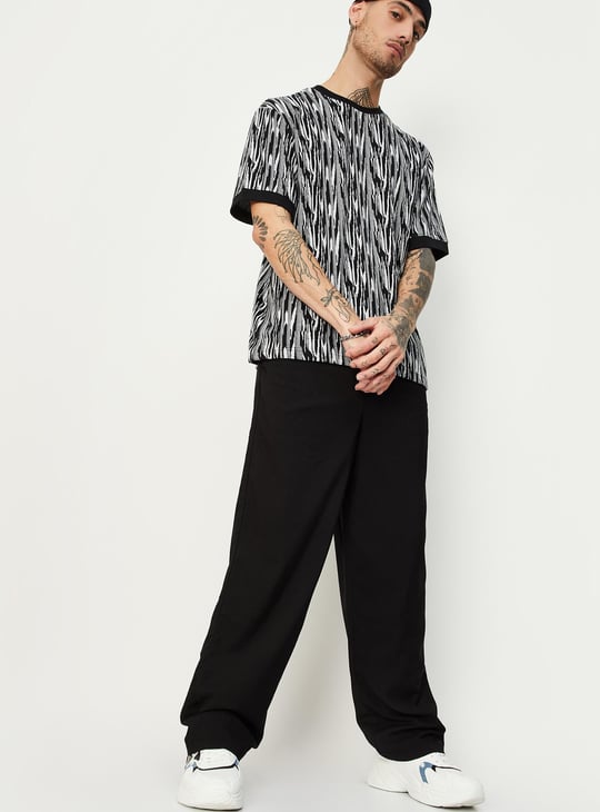 Men Solid Loose Fit Pleated Pants