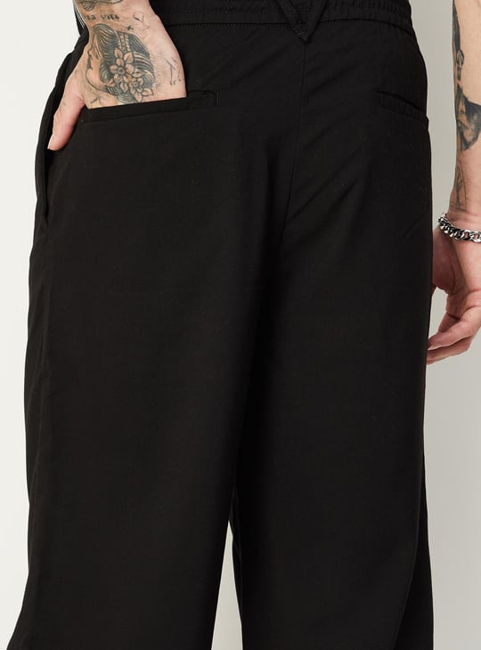 Men Solid Loose Fit Pleated Pants