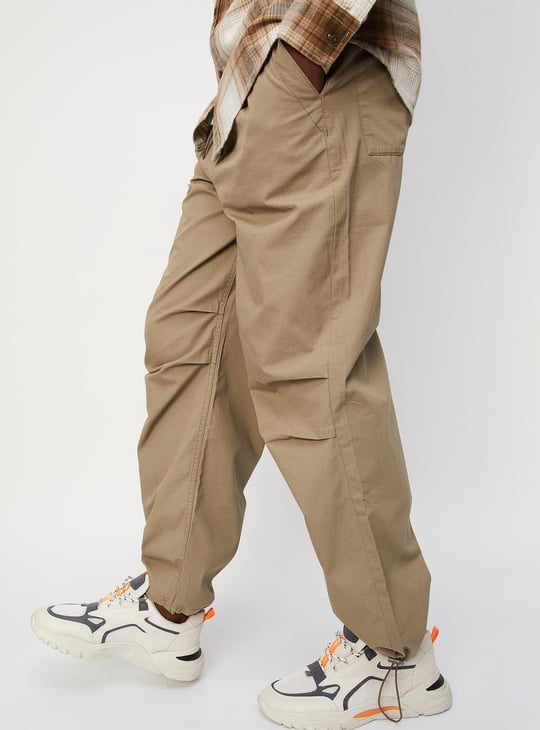 Men Solid Relaxed Fit Parachute Pants