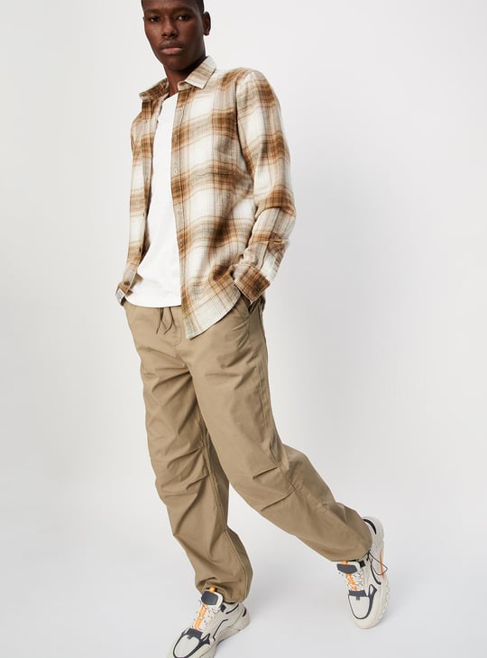 Men Solid Relaxed Fit Parachute Pants