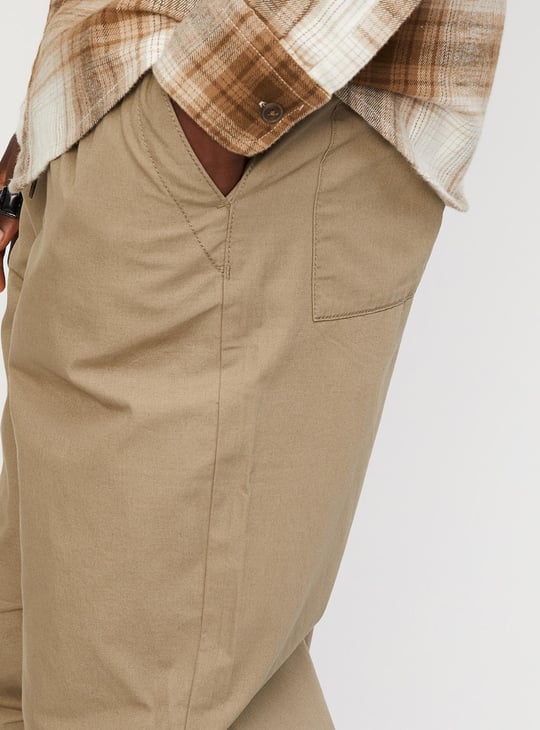 Men Solid Relaxed Fit Parachute Pants