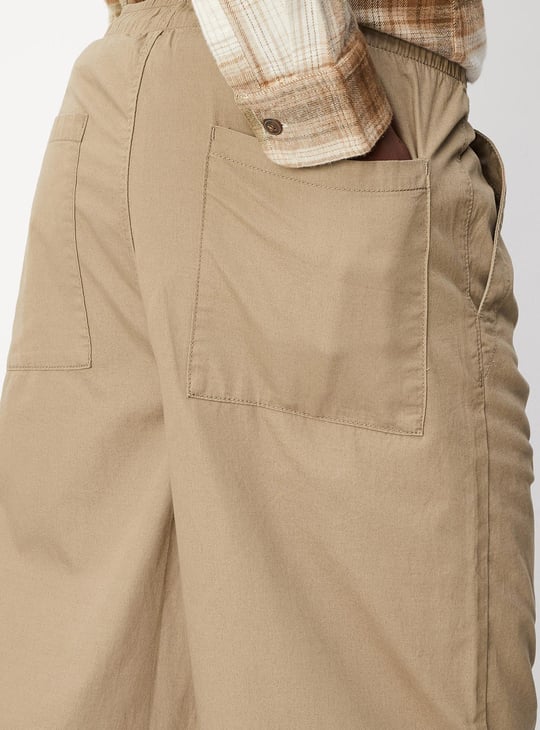 Men Solid Relaxed Fit Parachute Pants