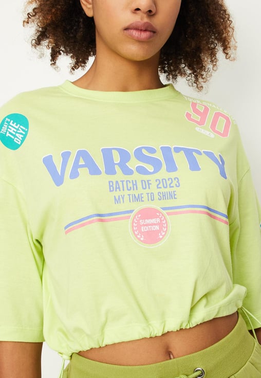 Buy Women Varsity Printed Crop T-shirt Online at just Rs