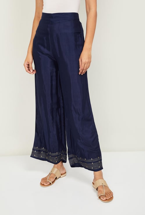 W Women Embroidered Hem Flared Palazzos