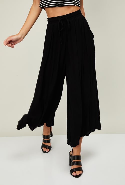 CODE Women Solid Flared Palazzos