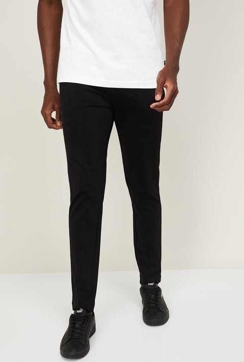 PUMA Men Solid Regular Fit Track Pants