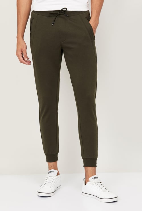 FAME FOREVER Men Solid Elasticated Joggers