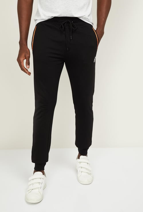 STATUS QUO Men Solid Elasticated Joggers