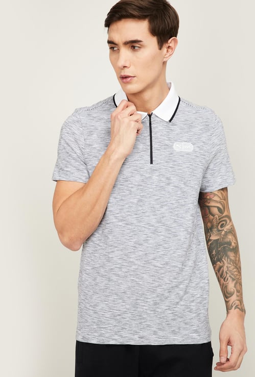 PUMA Men Striped Regular Fit Polo T-shirt