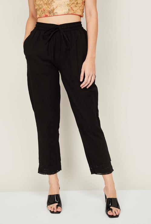 IMARA Women Solid Straight Pants with Tasseled Hem