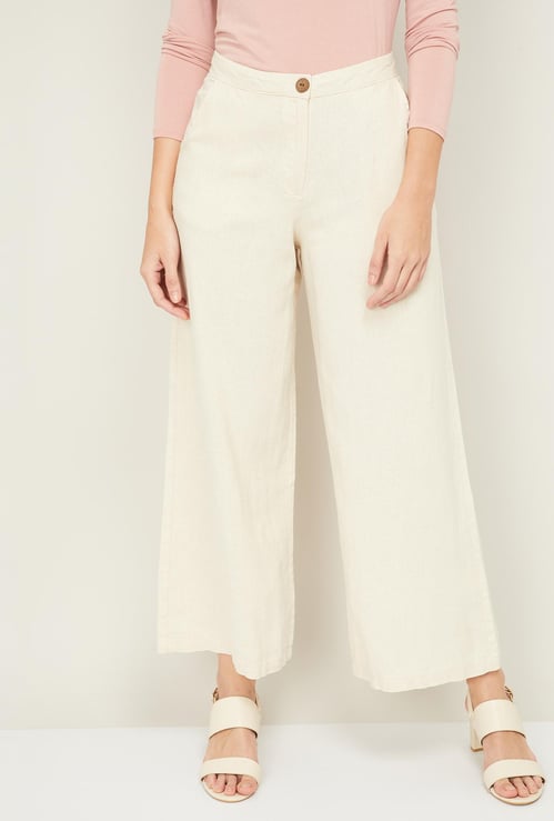 AND Women Solid Woven Flared Pants