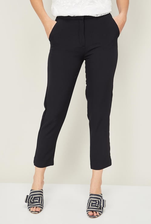 AND Women Solid Cropped Casual Trousers
