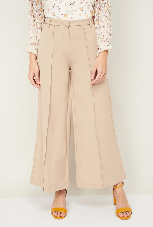 AND Women Solid Flared Trousers