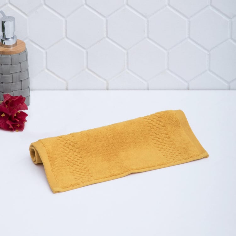 SPACES Solid Textured Face Towel