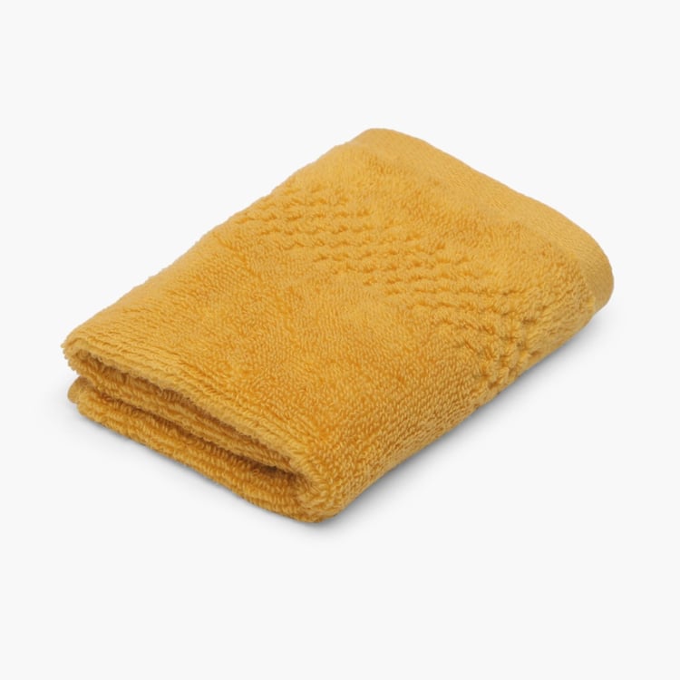 SPACES Solid Textured Face Towel