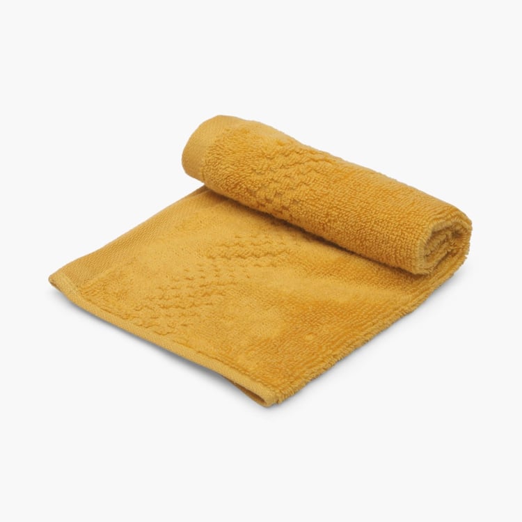 SPACES Solid Textured Face Towel