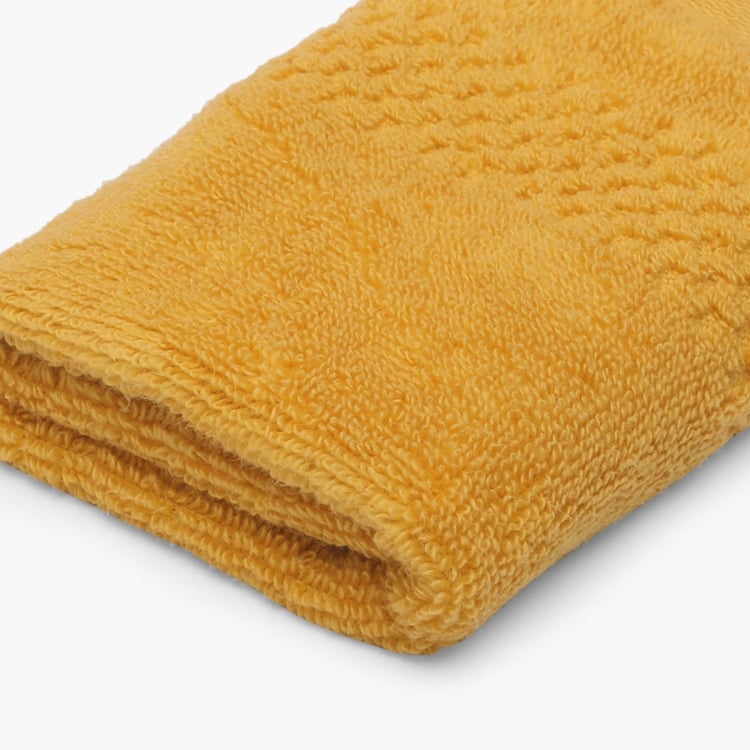 SPACES Solid Textured Face Towel