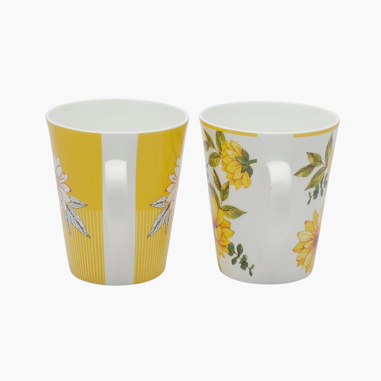 Clay Craft White And Yellow Printed Ceramic Mug - 330ml - Set of 2