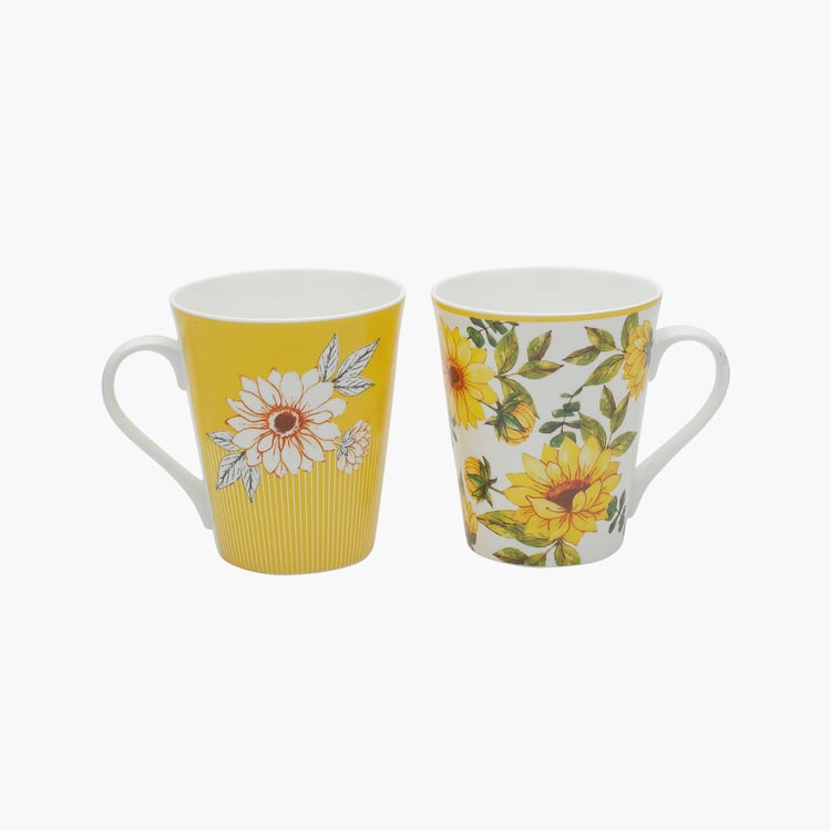 Clay Craft White And Yellow Printed Ceramic Mug - 330ml - Set of 2