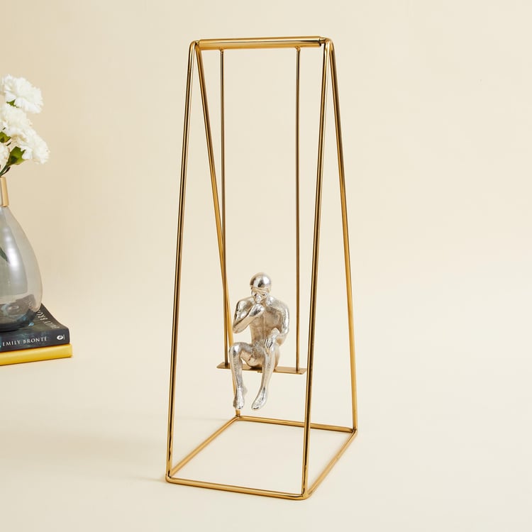 Splendid Gold Rush Metal Man on Swing Table Accent