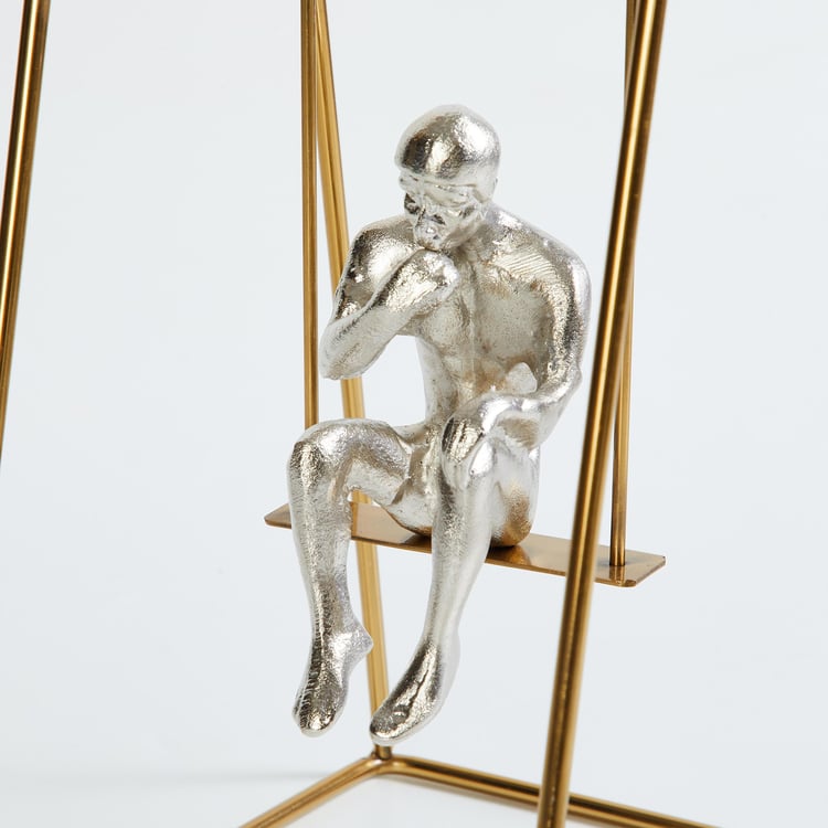 Splendid Gold Rush Metal Man on Swing Table Accent