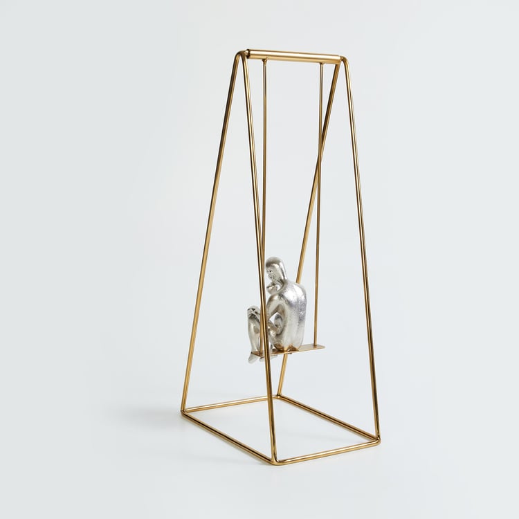 Splendid Gold Rush Metal Man on Swing Table Accent