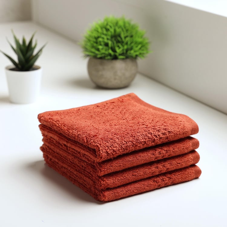SPACES Swift Dry Set of 4 Cotton Textured Face Towel, Orange - 30x30cm