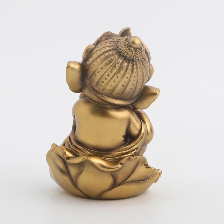 Tranquil Polyresin Ganesha with Flute Figurine