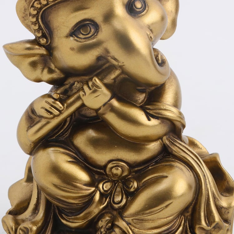 Tranquil Polyresin Ganesha with Flute Figurine