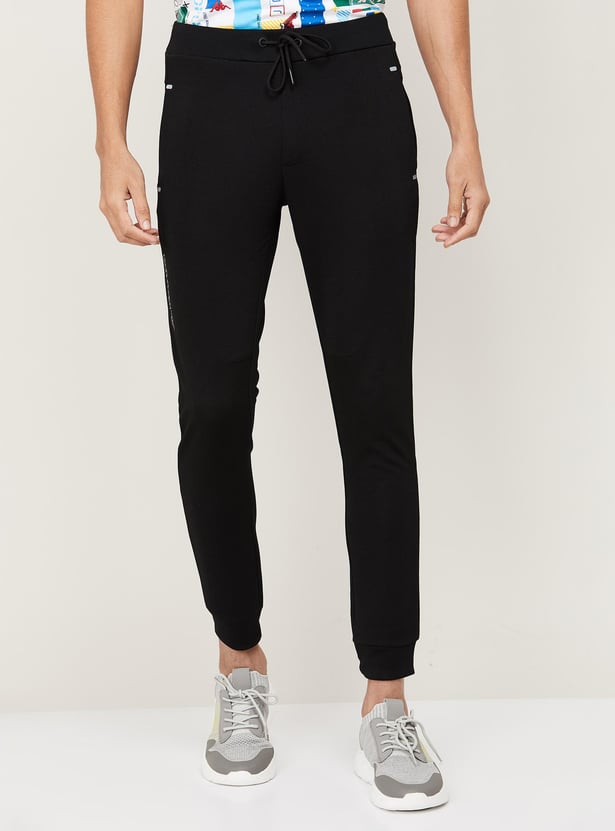 Buy KAPPA Men Solid Slim Fit Joggers from Kappa at just INR